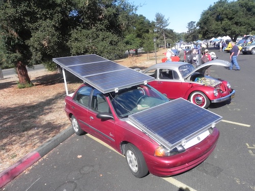 Electric car with solar on sale panels on roof